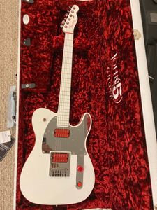 The John 5 White Telecaster guitar is a fantastic instrument that truly stands out in the world of electric guitars. It is a signature model of the renowned guitarist John 5, known for his work with Marilyn Manson and Rob Zombie, among others.

The first thing you notice about this guitar is its stunning aesthetic. The white finish is immaculate and gives the guitar a sleek, modern look. The chrome hardware and matching headstock add to the overall visual appeal, making it a real eye-catcher on stage.

But the John 5 White Telecaster is not just about looks. It delivers a wide range of tones, thanks to its dual Fender Custom Shop Twisted Tele pickups. These pickups offer everything from warm, vintage tones to high-output sounds, making this guitar incredibly versatile. Whether you're playing country, rock, metal, or anything in between, this guitar can handle it.

The neck of the guitar is a comfortable '60s "C"-shaped profile, which is easy to play and allows for fast, smooth transitions up and down the fretboard. The guitar also features a 6-saddle American Tele bridge, which provides excellent intonation and sustain.

In conclusion, the John 5 White Telecaster is a high-quality, versatile guitar that not only looks great but also delivers in terms of sound and playability. It is a testament to John 5's unique style and musicianship, making it a must-have for any fan of his work or anyone looking for a top-notch Telecaster.