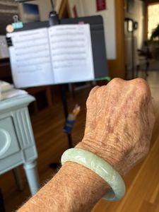 Mason Kay’s integrity is the thing that makes buying form y’all a must. You KNOW it will be untreated, natural material. This light apple-green carved bangle rings like a bell and is nice and icy on the wrist. It’s a lovely, glowing jade. I’m very happy to have been able to buy it. High recommendations to all seekers of fine jade. And I’m a G.G. from G.I.A. so I can say this with confidence.