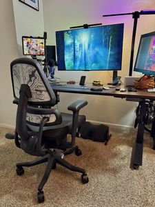 I’ve been using the Anthros chair for a while now, and I’m really impressed overall. The pelvic support is what stands out to me the most; it hugs your pelvis in a way that feels natural and secure, gently guiding you into proper posture without forcing it. Plus, the small back support keeps my shoulders open and arms free for movement, which has made long sessions working on my digital art much more comfortable.
The tilt mechanism and the wide range of armrest adjustments make it easy to stay comfortable throughout the day, especially during extended creative sessions. The build quality feels solid and premium, and everything about the chair feels thoughtfully designed. One small thing I’ve noticed is that the chair can be a little awkward to maneuver if you grab it by the armrests, since they can move out of position. I’ve just learned to grab it from the back post instead. It’s not a big deal, just a minor nuisance worth mentioning.
I was also surprised by how much I like the footrest; I honestly didn’t think I would use it much, but it’s become a great feature for taking pressure off my lower back during breaks.
The modular design is another big plus. Being able to easily replace the seat cushion (and other components if needed) makes the chair feel like a long-term investment rather than something you’ll have to replace entirely down the line.
I did run into one issue: the leather upholstery was way too warm for me during longer sessions. I contacted customer service, and they resolved it quickly by sending me a cloth fabric replacement; I just had to pay for shipping. Their customer service was excellent: responsive, understanding, and genuinely focused on making sure I was happy with the chair.
I highly recommend the Anthros chair, definitely on the expensive side, but for me it’s absolutely been worth the cost. The comfort, adjustability, modular design, and relief from back pain make it a smart investment, especially if you spend long hours seated.