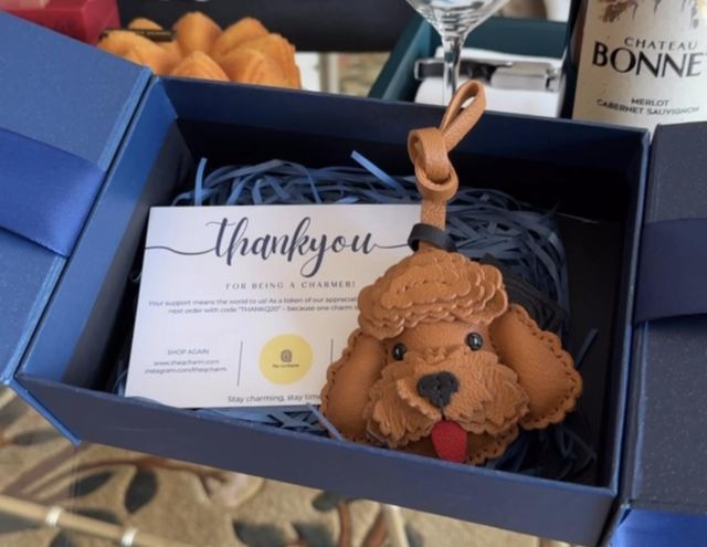 Thoughtfully wrapped handcrafted leather gift with ribbon and handwritten note