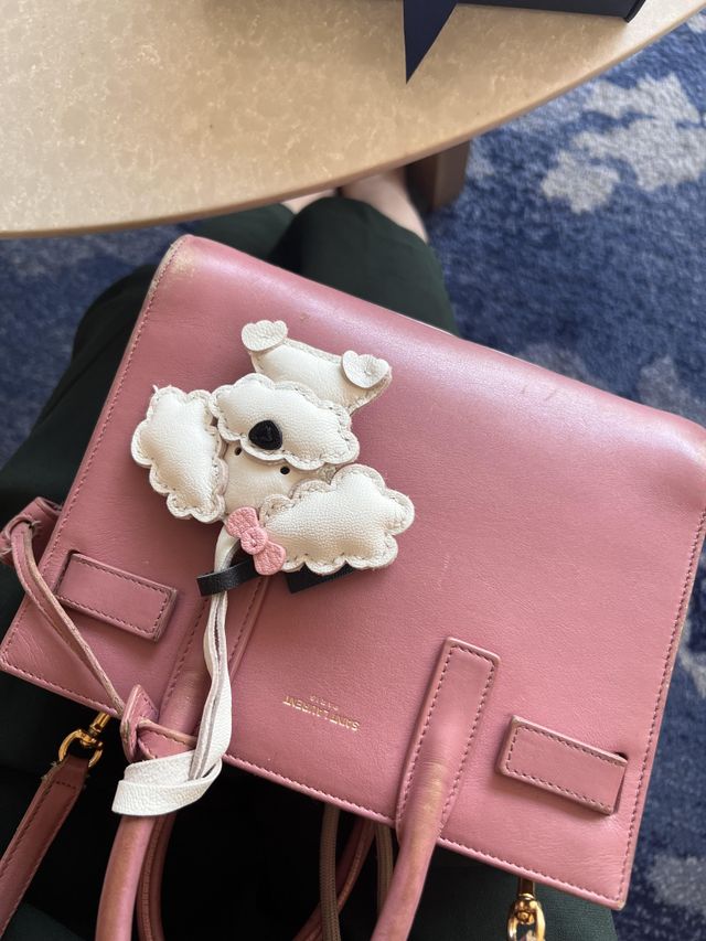 Elegant leather dog charm with balanced proportions